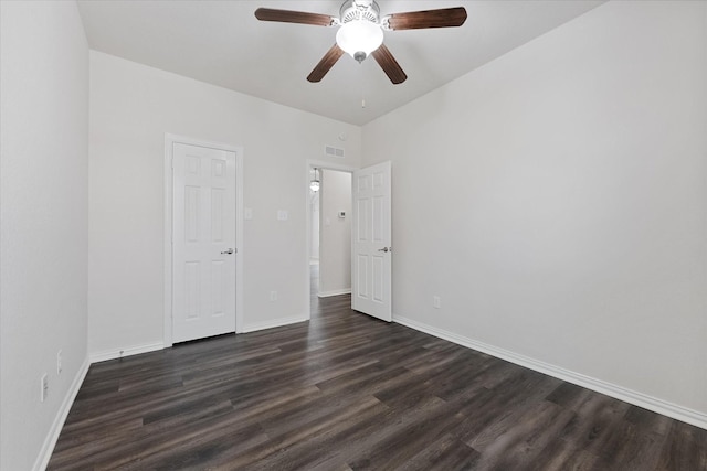 25303 Hawthorne Blossom Dr, Spring, TX 77389 - unfurnished bedroom featuring dark wood-style flooring, baseboards, and a ceiling fan