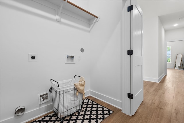 5306 San Juan St, Houston, TX 77020 - laundry room with hookup for an electric dryer, washer hookup, wood finished floors, baseboards, and gas dryer hookup
