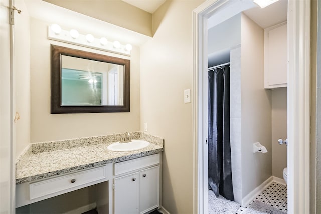 1510 Elmscott Dr, Sugar Land, TX 77498 - full bathroom with vanity, toilet, baseboards, and a shower with curtain