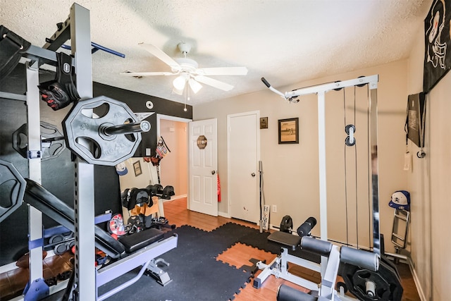 1510 Elmscott Dr, Sugar Land, TX 77498 - exercise area with ceiling fan and a textured ceiling