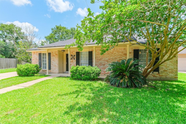 1510 Elmscott Dr, Sugar Land, TX 77498 - ranch-style house with brick siding, covered porch, and roof with shingles