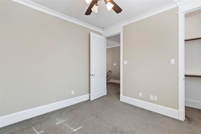 428 W 26th St, Houston, TX 77008 - unfurnished bedroom with carpet flooring, crown molding, baseboards, a closet, and ceiling fan