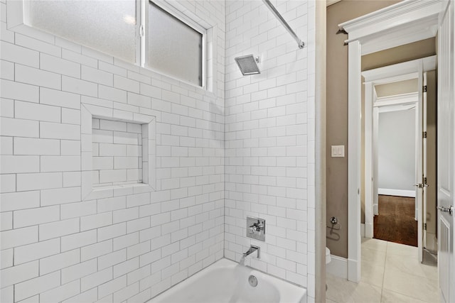 428 W 26th St, Houston, TX 77008 - bathroom featuring shower / washtub combination, toilet, and baseboards