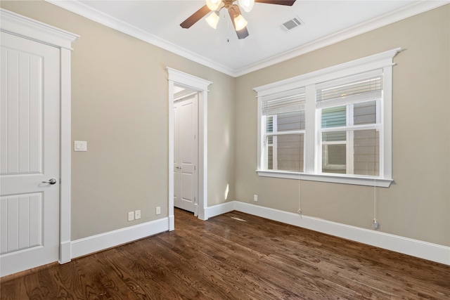 428 W 26th St, Houston, TX 77008 - unfurnished bedroom with dark wood-type flooring, ornamental molding, baseboards, and a ceiling fan