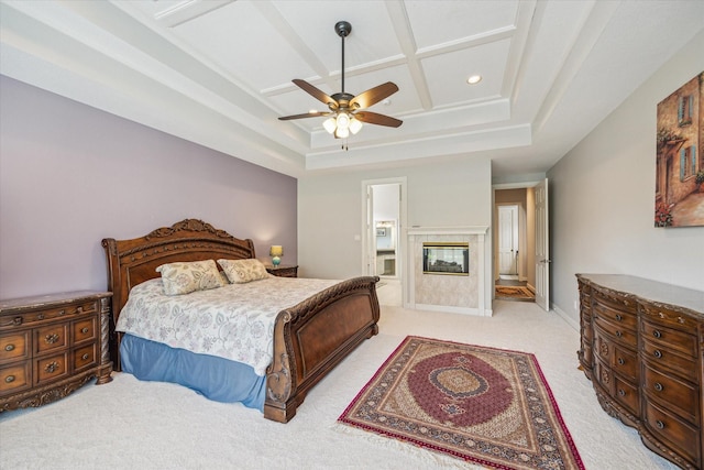 13627 Ashley Run, Houston, TX 77077 - bedroom featuring coffered ceiling, light carpet, recessed lighting, a tile fireplace, and a tray ceiling
