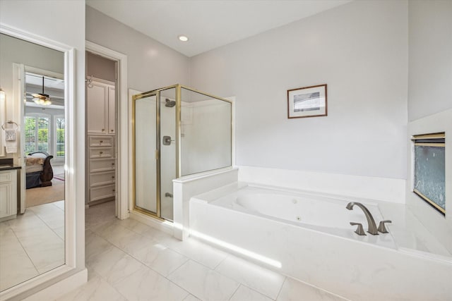 13627 Ashley Run, Houston, TX 77077 - full bathroom with a stall shower, a garden tub, ensuite bathroom, and marble finish floors