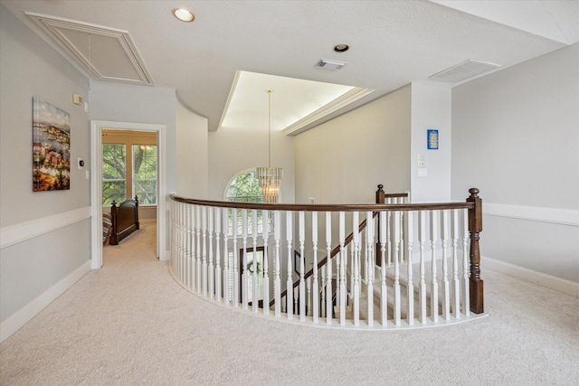 13627 Ashley Run, Houston, TX 77077 - hallway with attic access, an upstairs landing, carpet flooring, and baseboards