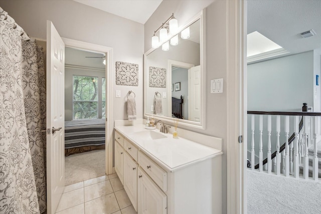 13627 Ashley Run, Houston, TX 77077 - full bath with vanity, tile patterned floors, and ensuite bath