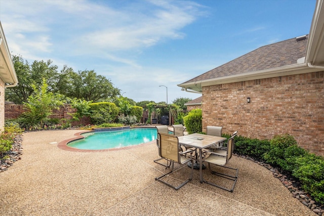 13627 Ashley Run, Houston, TX 77077 - view of pool with a fenced backyard, a patio, and outdoor dining area