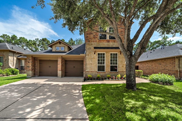 6823 Rosemont Park Ln, Katy, TX 77494 - traditional-style house with a garage, a front lawn, driveway, and brick siding