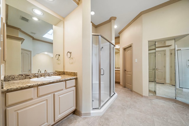 6823 Rosemont Park Ln, Katy, TX 77494 - full bathroom featuring ornamental molding, a stall shower, vanity, baseboards, and tile patterned floors
