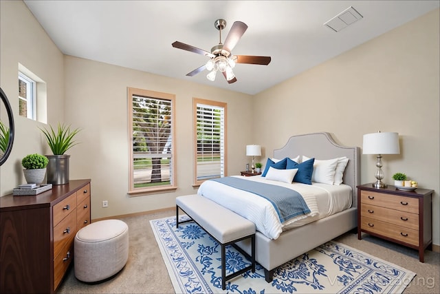 6823 Rosemont Park Ln, Katy, TX 77494 - bedroom featuring light carpet, multiple windows, and baseboards