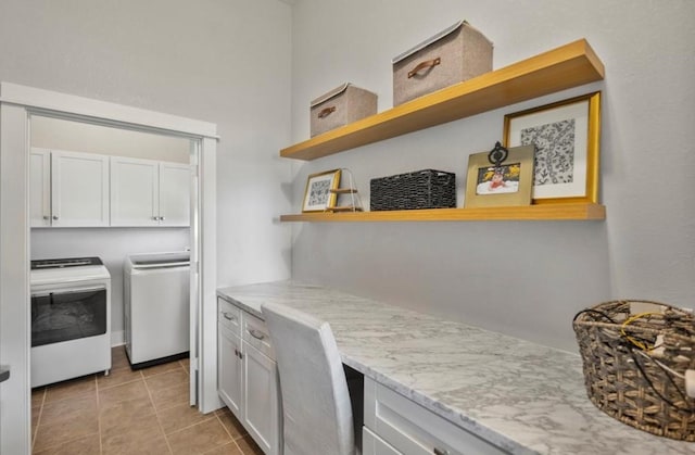 539 Elm St, New Ulm, TX 78950 - laundry area with washer and clothes dryer, cabinet space, and light tile patterned flooring