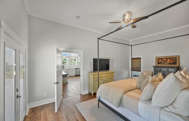 539 Elm St, New Ulm, TX 78950 - bedroom featuring hardwood / wood-style floors, ornamental molding, baseboards, and a ceiling fan