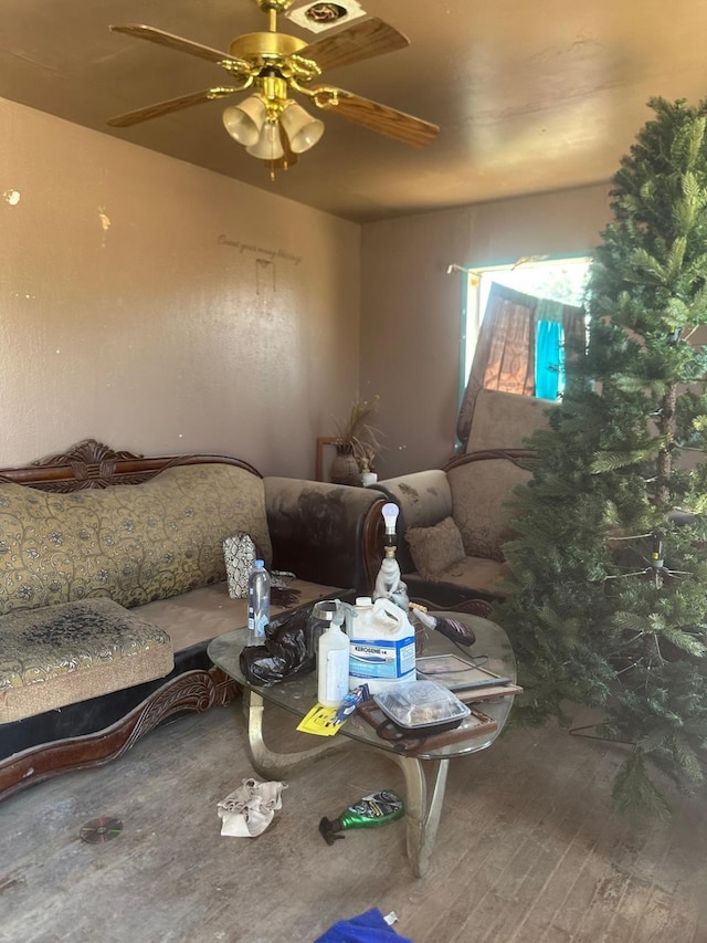 1409 Johnston St, Midland, TX 79701 - living area with wood finished floors and a ceiling fan