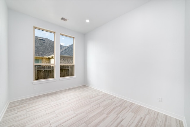 7822 Taronga Ln, Richmond, TX 77407 - unfurnished room featuring baseboards, light wood-style flooring, and recessed lighting