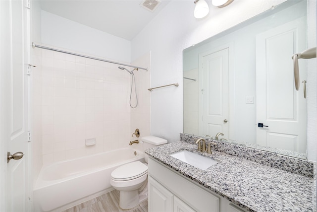 7822 Taronga Ln, Richmond, TX 77407 - bathroom featuring vanity, bathtub / shower combination, toilet, and wood finished floors
