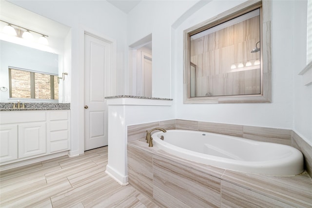 7822 Taronga Ln, Richmond, TX 77407 - full bathroom featuring a bath and vanity