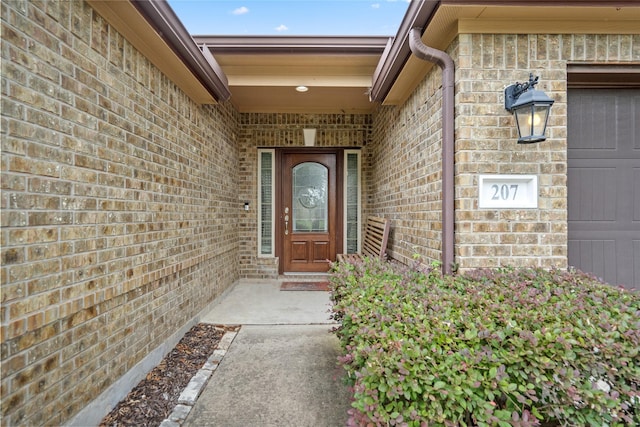 207 Lockridge Hill Ln, Richmond, TX 77469 - view of exterior entry featuring brick siding
