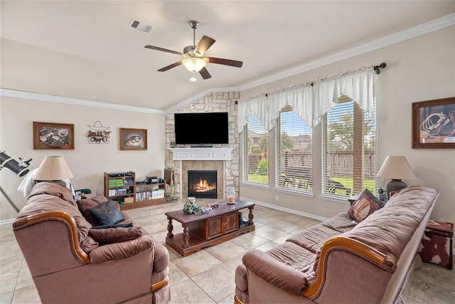 207 Lockridge Hill Ln, Richmond, TX 77469 - living room with ornamental molding, ceiling fan, lofted ceiling, a fireplace, and light tile patterned floors