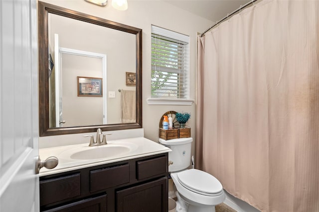 207 Lockridge Hill Ln, Richmond, TX 77469 - full bathroom featuring vanity, toilet, and a shower with curtain