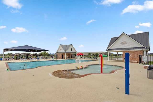 207 Lockridge Hill Ln, Richmond, TX 77469 - community pool featuring a patio