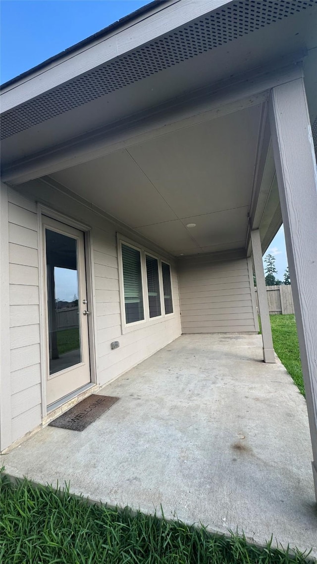 13909 Payette Arbor Ct, Conroe, TX 77384 - view of patio featuring an attached carport