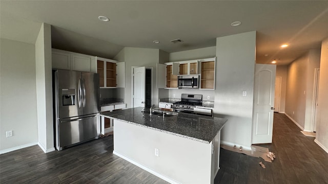 13909 Payette Arbor Ct, Conroe, TX 77384 - kitchen featuring appliances with stainless steel finishes, open shelves, a sink, dark wood-style flooring, and recessed lighting