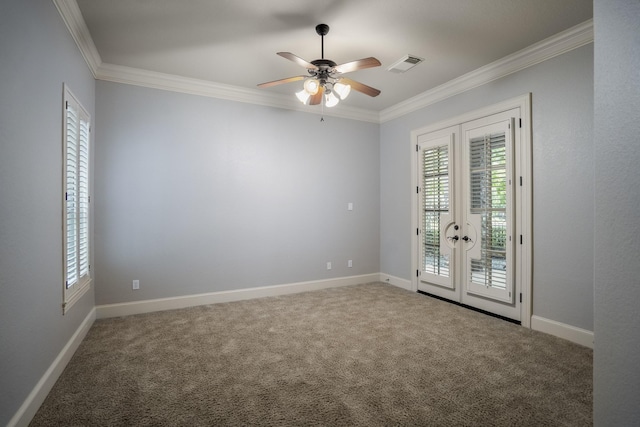 14214 Heidi Oaks Ln, Humble, TX 77396 - spare room featuring french doors, crown molding, a ceiling fan, carpet floors, and baseboards