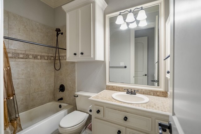 14214 Heidi Oaks Ln, Humble, TX 77396 - full bath featuring bathing tub / shower combination, vanity, toilet, and crown molding