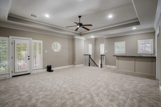 14214 Heidi Oaks Ln, Humble, TX 77396 - carpeted spare room featuring a raised ceiling, ceiling fan, ornamental molding, recessed lighting, and baseboards
