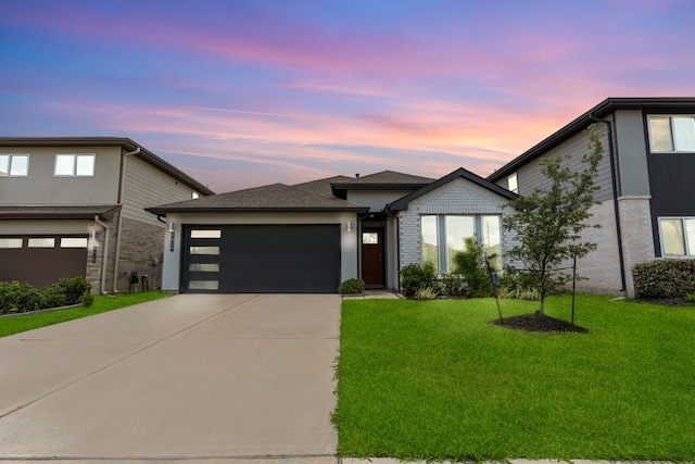 7414 Keystone Blossom Trl, Richmond, TX 77407 - view of front of property with a garage, driveway, and a lawn