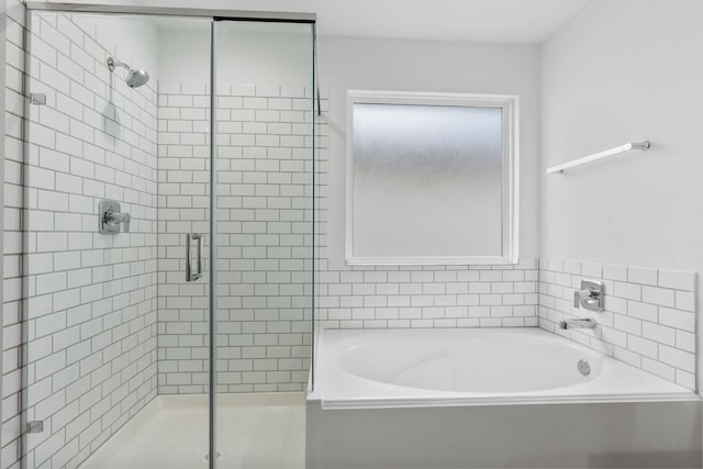 7414 Keystone Blossom Trl, Richmond, TX 77407 - full bathroom featuring a shower stall and a bath