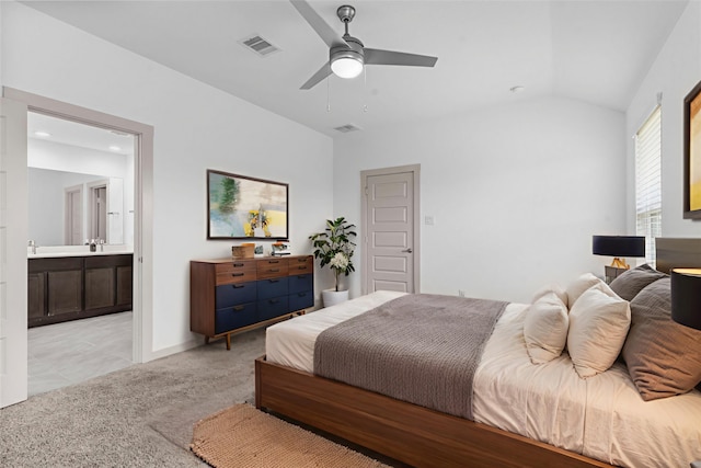 7414 Keystone Blossom Trl, Richmond, TX 77407 - bedroom featuring lofted ceiling, light carpet, connected bathroom, ceiling fan, and light tile patterned floors