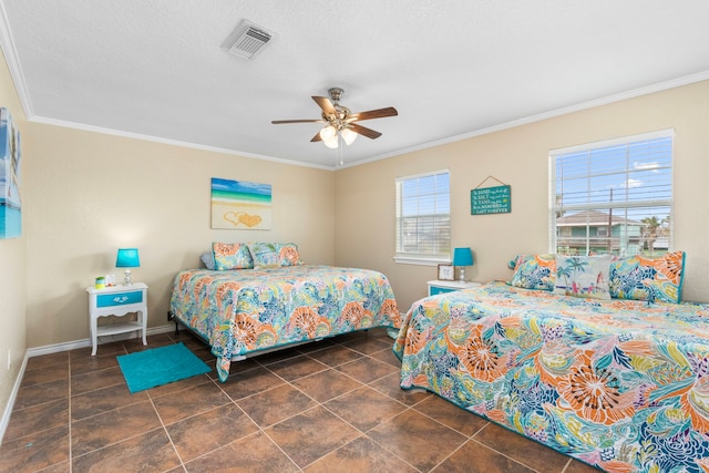621 County Road 202, Sargent, TX 77414 - tiled bedroom with ornamental molding, baseboards, and a ceiling fan