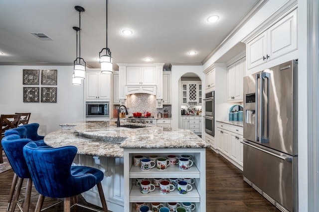 18815 Ellis Bend Dr, Cypress, TX 77433 - kitchen featuring appliances with stainless steel finishes, open shelves, a sink, white cabinets, and recessed lighting
