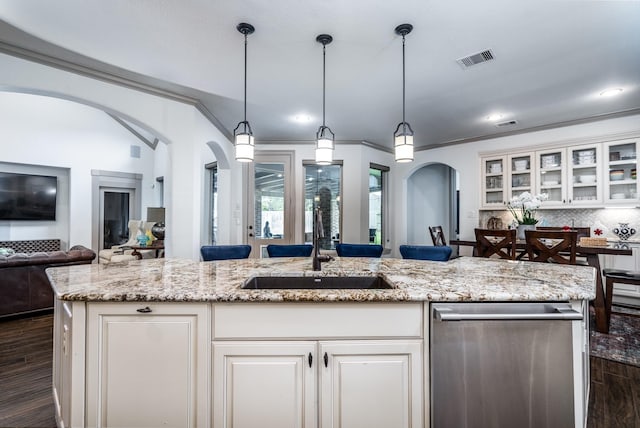 18815 Ellis Bend Dr, Cypress, TX 77433 - kitchen with dishwasher, open floor plan, dark wood-type flooring, a sink, and ornamental molding