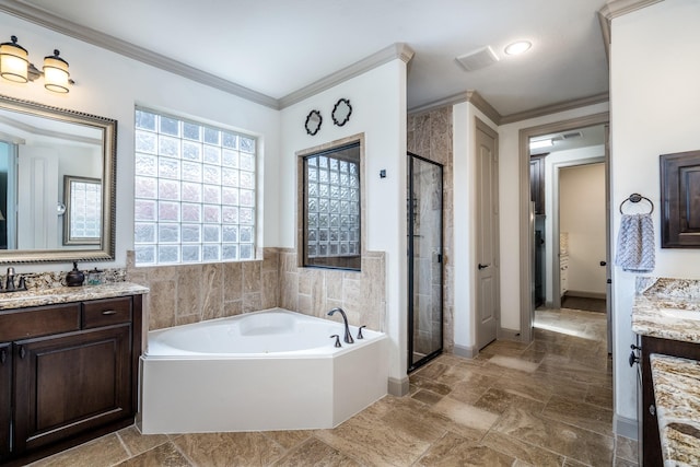 18815 Ellis Bend Dr, Cypress, TX 77433 - full bath with a shower stall, a garden tub, two vanities, crown molding, and baseboards