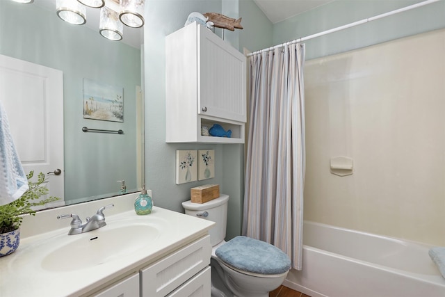 4123 King Rail Cir, Galveston, TX 77554 - bathroom with toilet, vanity, and shower / bath combo with shower curtain