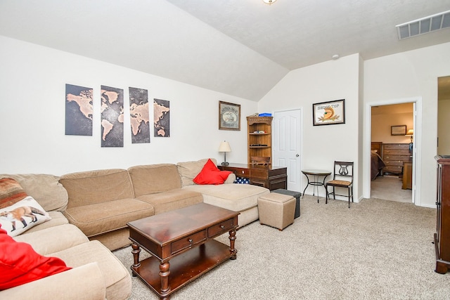 2818 Lakecrest Forest Dr, Katy, TX 77493 - carpeted living area featuring lofted ceiling and baseboards