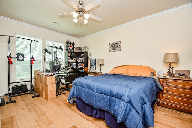 2818 Lakecrest Forest Dr, Katy, TX 77493 - bedroom with light wood finished floors, ornamental molding, ceiling fan, and an office area