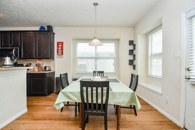 2818 Lakecrest Forest Dr, Katy, TX 77493 - dining room featuring light wood-type flooring