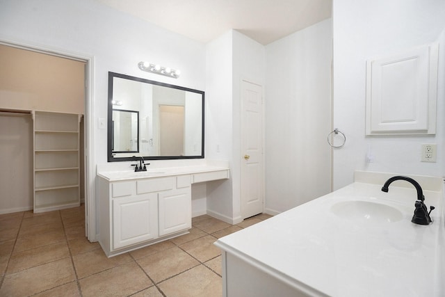 312 Cedar Branch Dr, League City, TX 77573 - bathroom featuring tile patterned floors, vanity, and a spacious closet