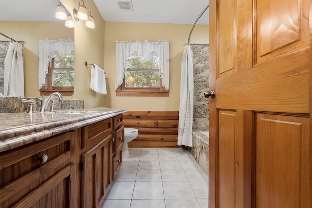 19314 Indigo Lake Dr, Magnolia, TX 77355 - full bath featuring vanity, toilet, tile patterned flooring, and shower / bath combo