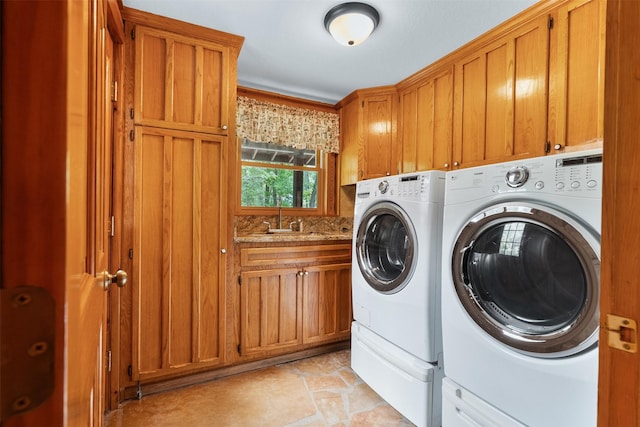 19314 Indigo Lake Dr, Magnolia, TX 77355 - washroom with washer and dryer and cabinet space