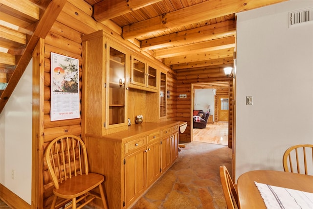 19314 Indigo Lake Dr, Magnolia, TX 77355 - corridor featuring log walls and wooden ceiling with exposed beams