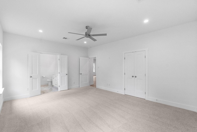 12219 Browning Dr, Montgomery, TX 77356 - unfurnished bedroom featuring recessed lighting, light colored carpet, ensuite bathroom, a closet, and baseboards