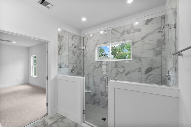 12219 Browning Dr, Montgomery, TX 77356 - bathroom with recessed lighting, marble look tiles, a stall shower, and baseboards