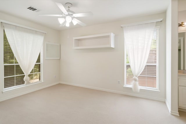 2113 Midway Ct, League City, TX 77573 - unfurnished room with a ceiling fan, light carpet, and baseboards