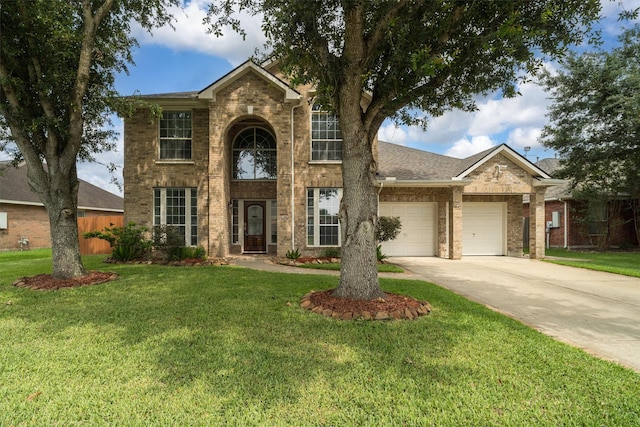 2113 Midway Ct, League City, TX 77573 - traditional-style home with brick siding, a garage, and concrete driveway